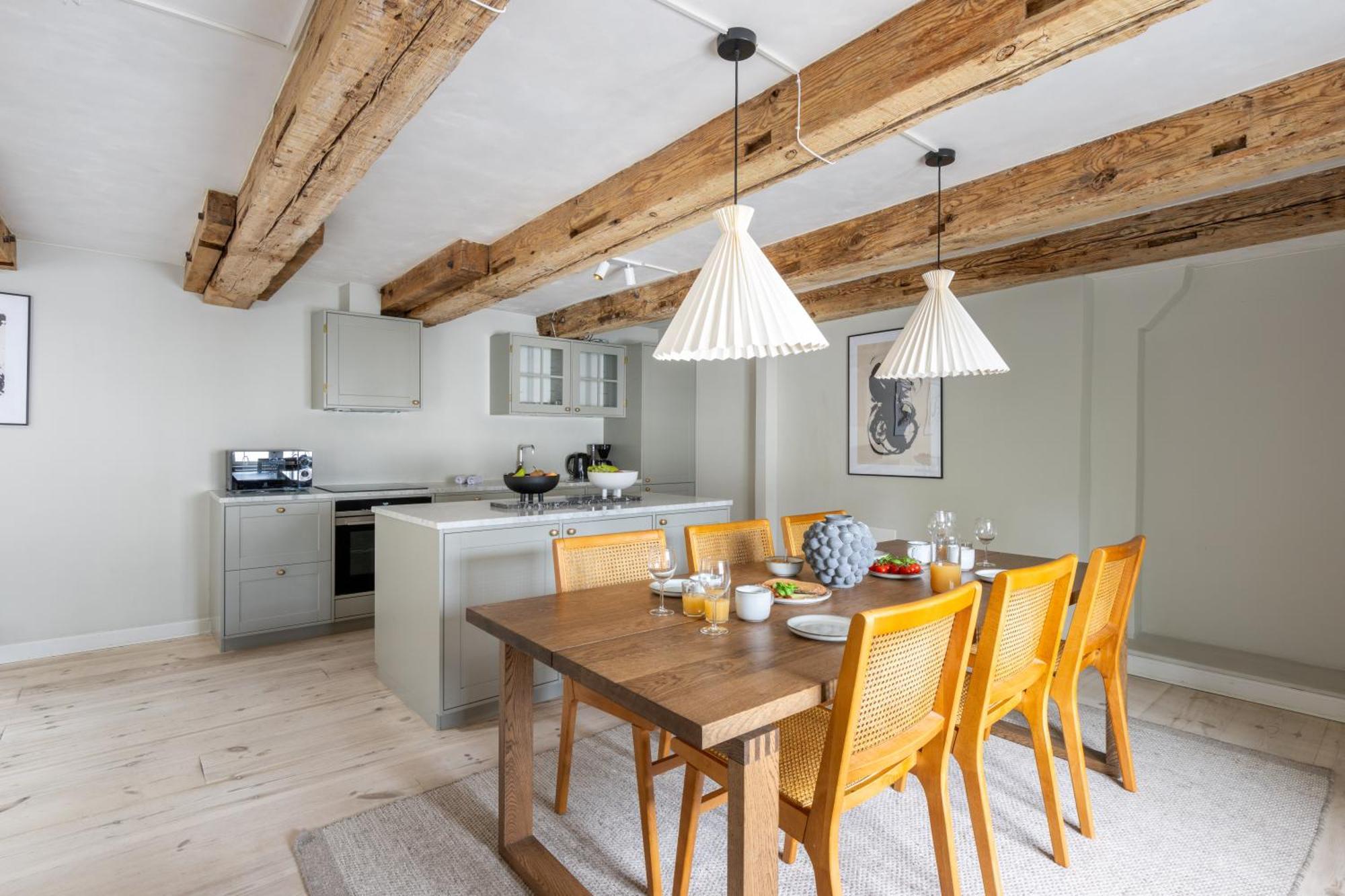 Apartment With Exposed Ceiling Beams *